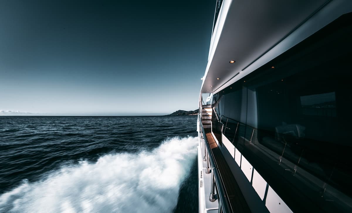 A luxury superyacht cruising across open water